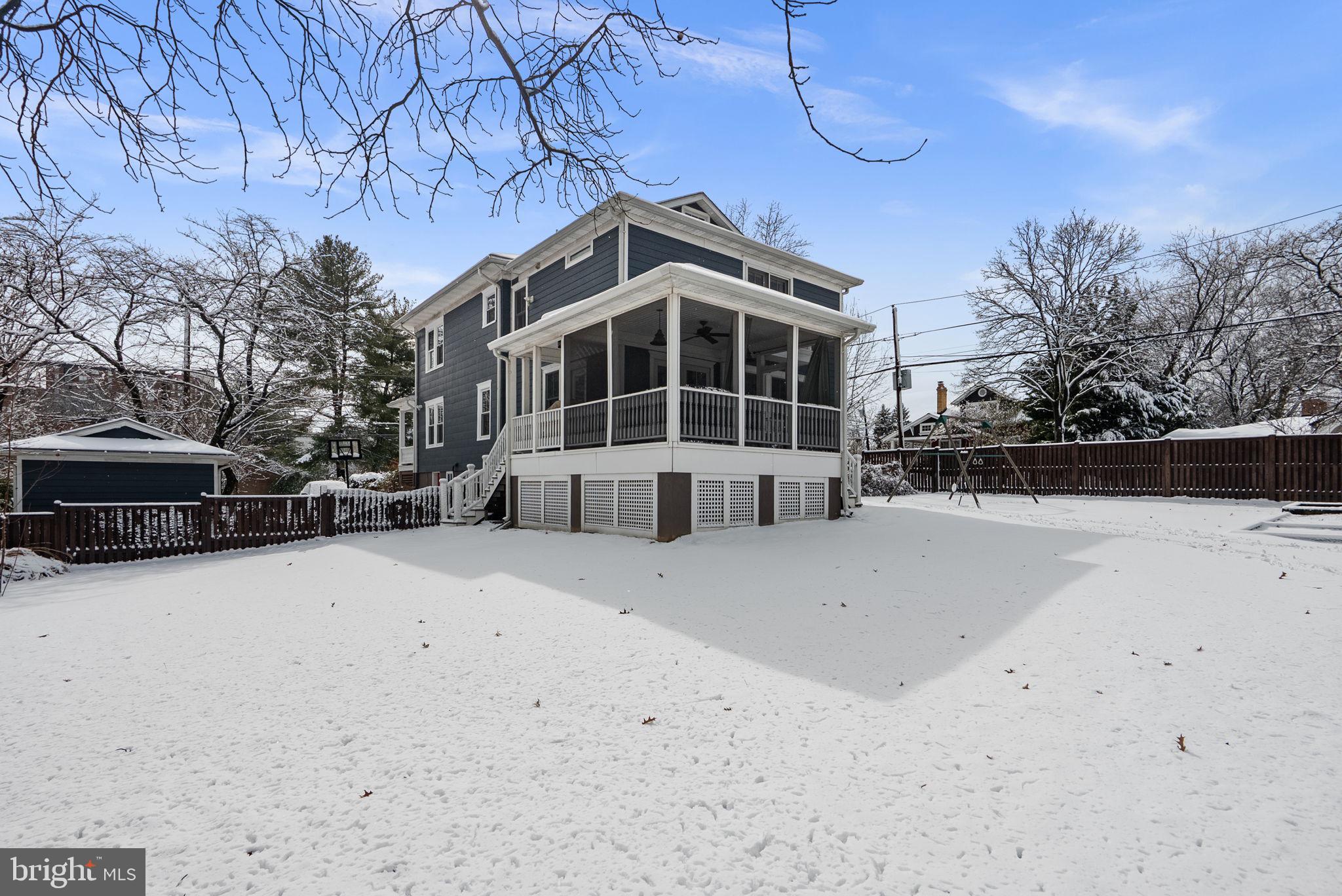 1415 Ballard Street Silver Spring, MD 20910 - Photo 7 of 56 a view of a house with a snow in the yard