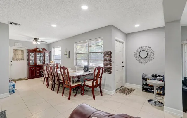 a view of a livingroom and dining room