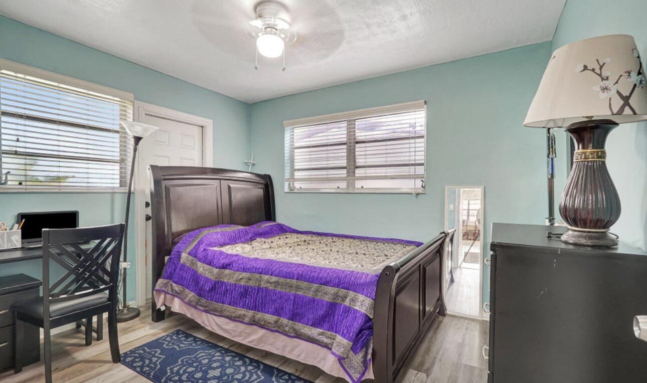 7530 Atlanta Street Hollywood, FL 33024 - Photo 21 of 23 a bedroom with bed and a window