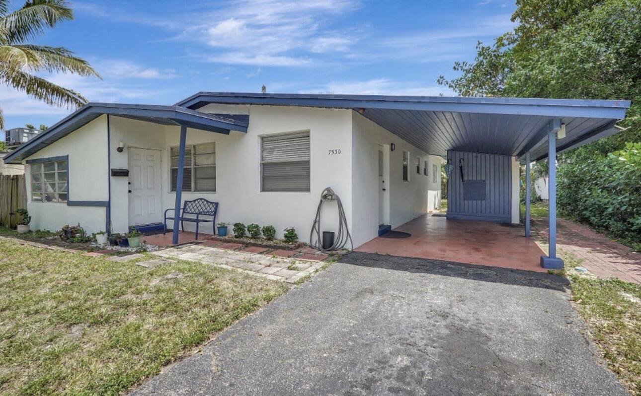 7530 Atlanta Street Hollywood, FL 33024 - Photo 4 of 23 a view of a house with backyard
