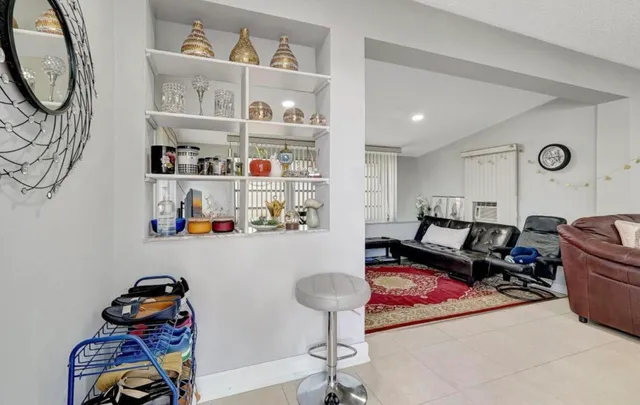 a room with lots of furniture and decor