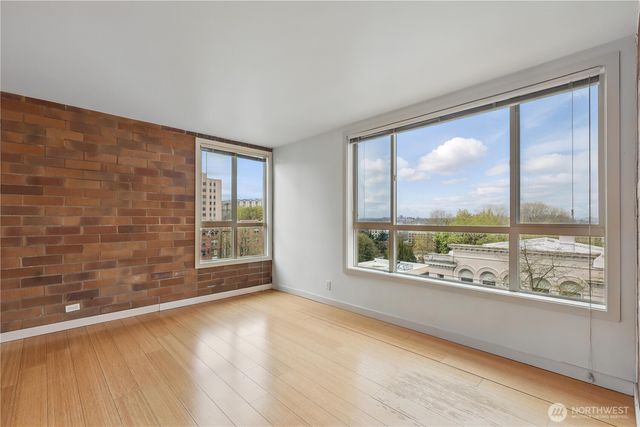 a view of an empty room with a window
