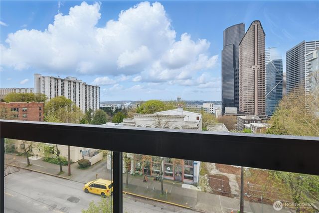 a view of balcony with furniture