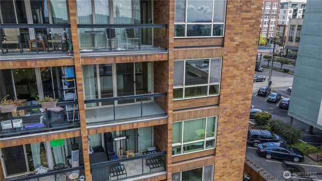 a view of a brick building from a balcony