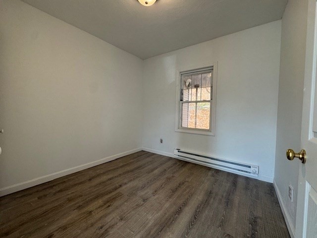 20 Ayer Road Shirley, MA 01464 - Photo 11 of 19 an empty room with wooden floor and windows