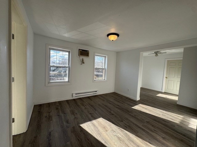 20 Ayer Road Shirley, MA 01464 - Photo 2 of 19 a view of an empty room with wooden floor and a window