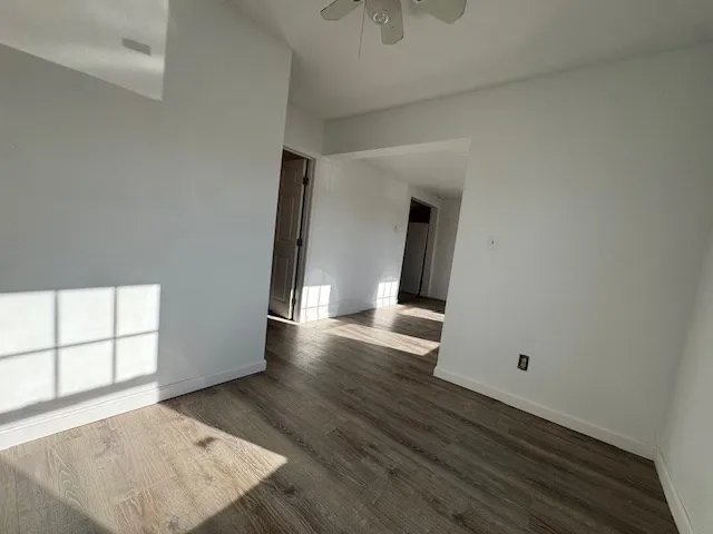 wooden floor in a hall with an entryway