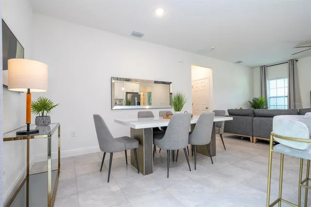 a view of a dining room with furniture