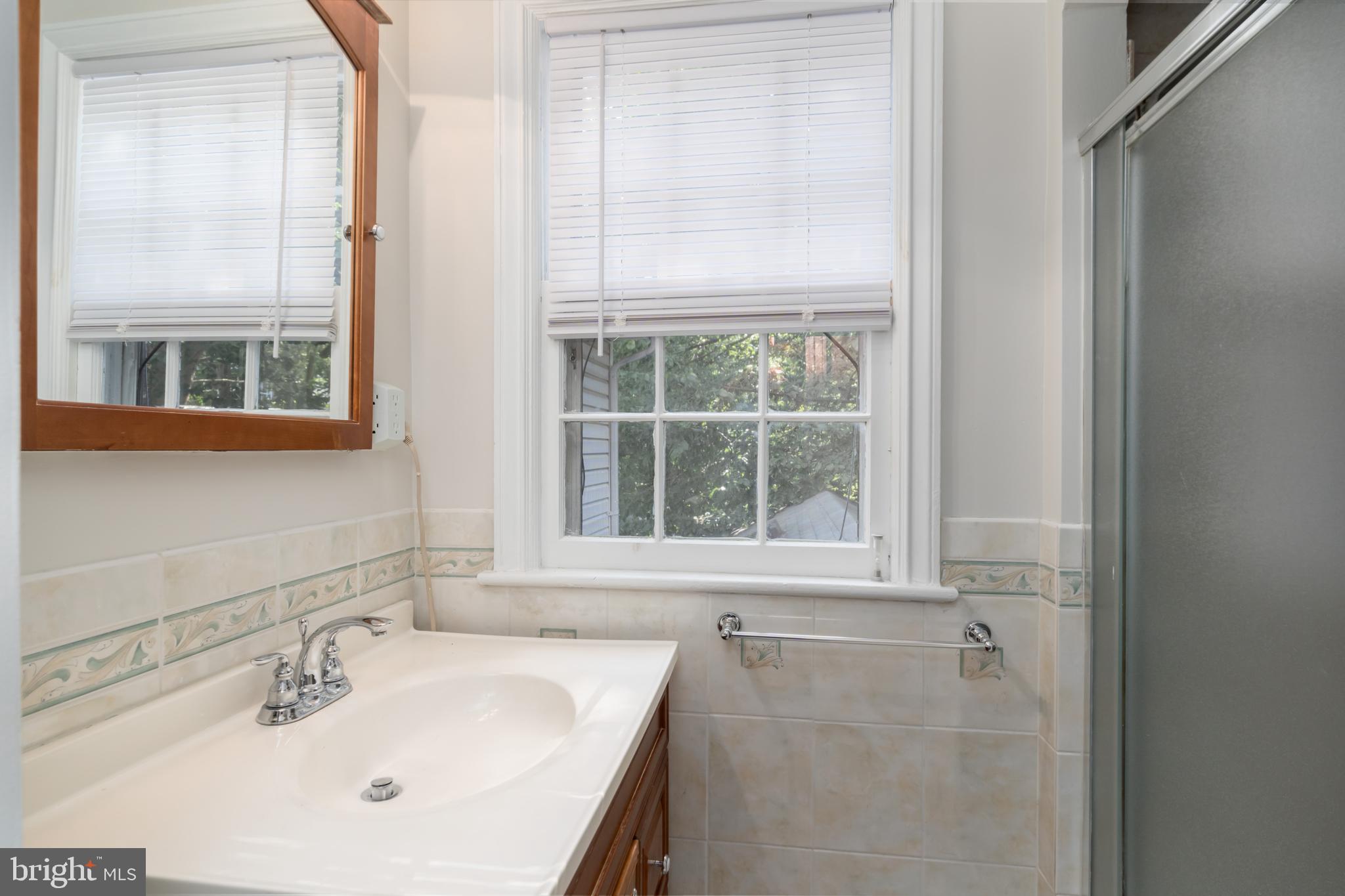 5016 Reno Road Northwest Washington, DC 20008 - Photo 20 of 38 Ensuite bath with walk-in shower.