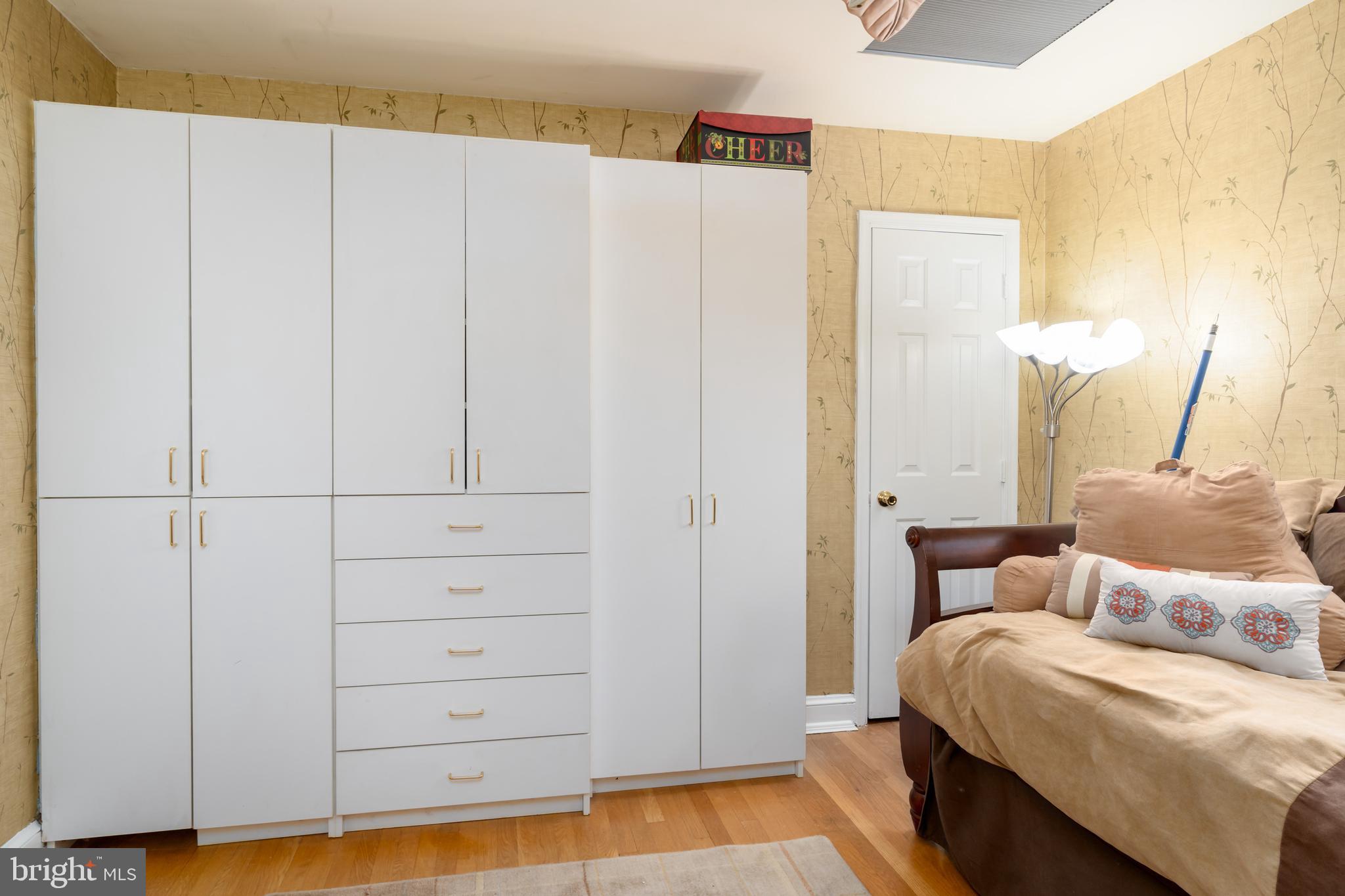 5016 Reno Road Northwest Washington, DC 20008 - Photo 22 of 38 Custom closet offers variety of storage options.