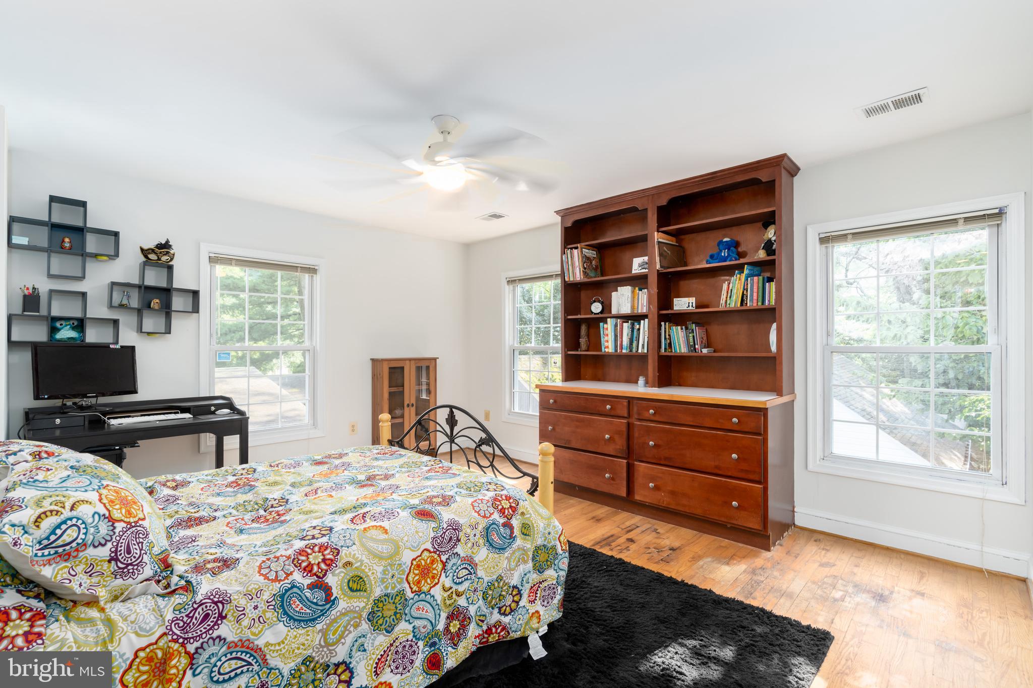 5016 Reno Road Northwest Washington, DC 20008 - Photo 23 of 38 Light and bright BR with custom storage & shelves.