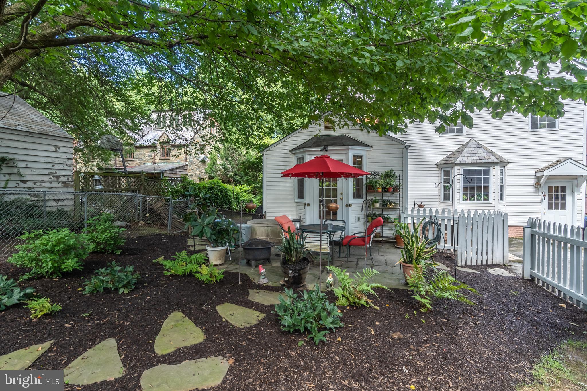 5016 Reno Road Northwest Washington, DC 20008 - Photo 34 of 38 Stepping stone paths add charm to this yard!