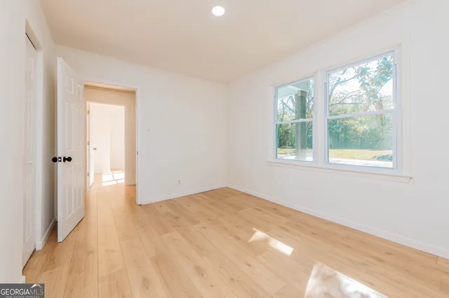 a view of an empty room and window