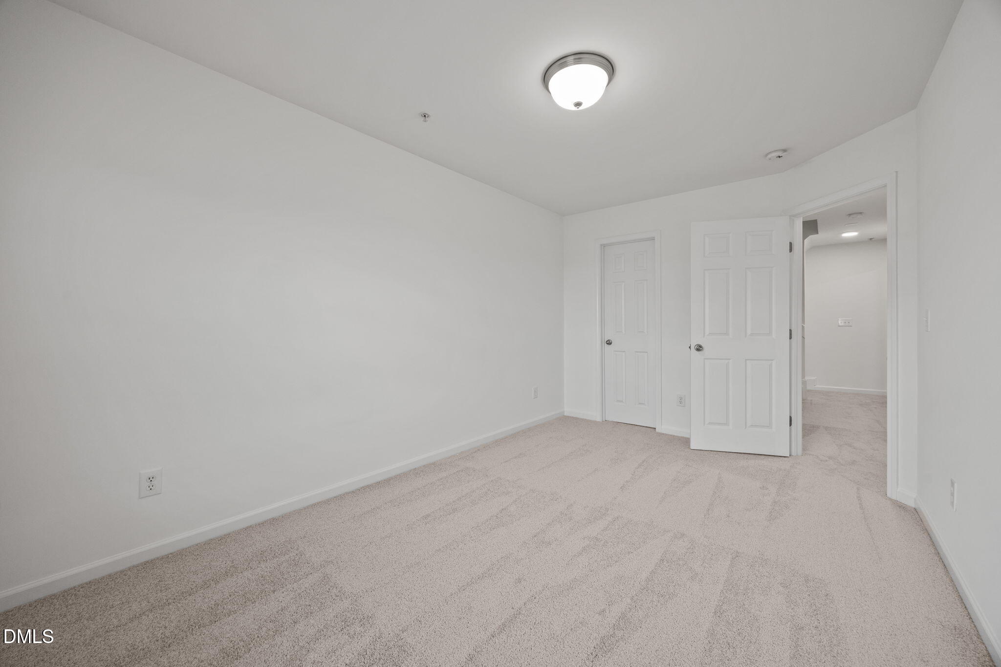 1111 Consortium Drive, Unit 109 Raleigh, NC 27603 - Photo 12 of 30 a view of an empty room