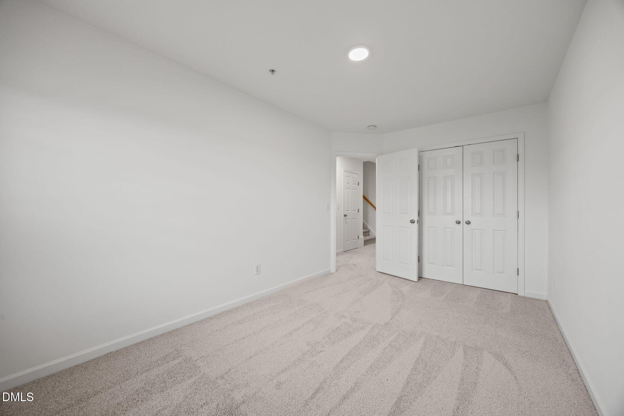 1111 Consortium Drive, Unit 109 Raleigh, NC 27603 - Photo 10 of 30 a view of an empty room