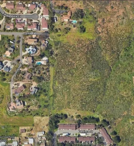 a view of residential houses with outdoor space
