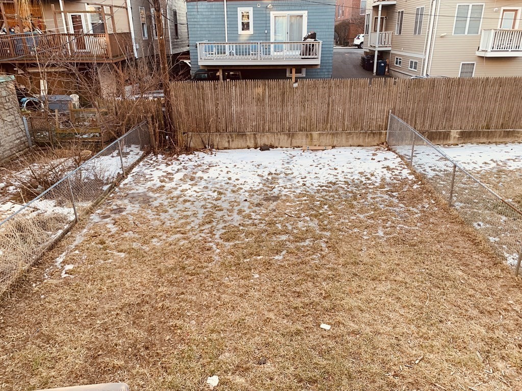 20 Howell Street, Unit 1 Boston, MA 02125 - Photo 10 of 10 a backyard of a house