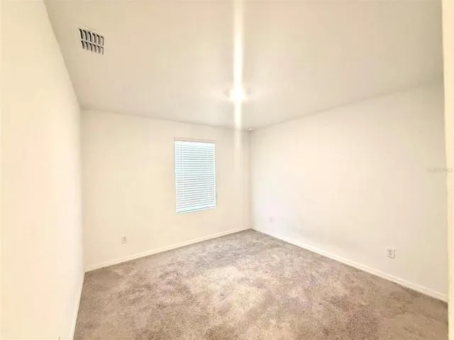 a view of empty room with window