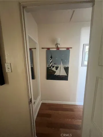 a spacious bedroom with a bed and a couch