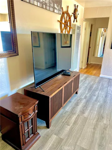 a view of kitchen island with wooden floor