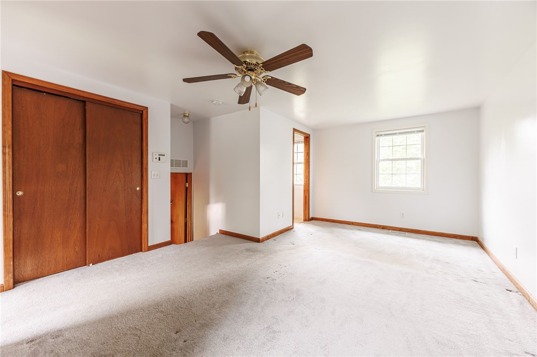 53 Guildhall Road Rochester, NY 14623 - Photo 20 of 35 Primary bedroom suite with multiple closets and full bath