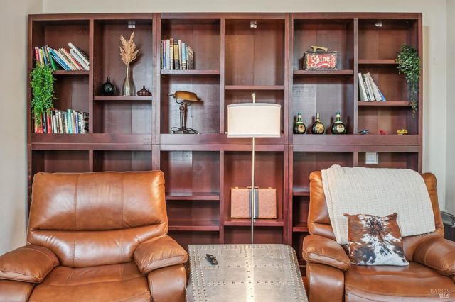 a room with a fireplace and a window