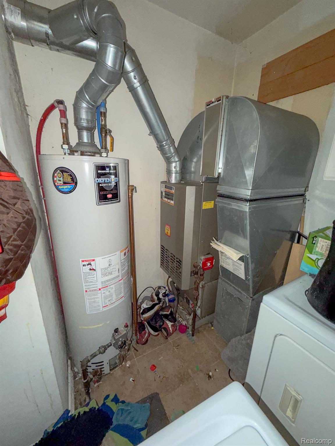 24811 Valley Avenue Eastpointe, MI 48021 - Photo 16 of 22 Utility room with heating unit and water heater