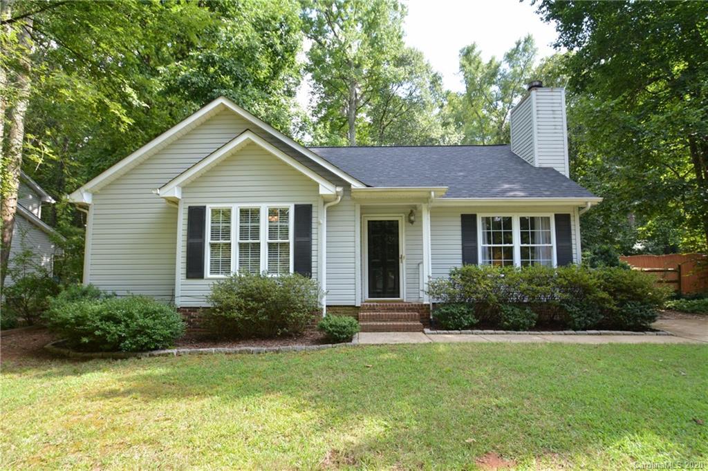 324 Radio Road, Unit 4 Charlotte, NC 28216 - Photo 1 of 19 a front view of a house with garden