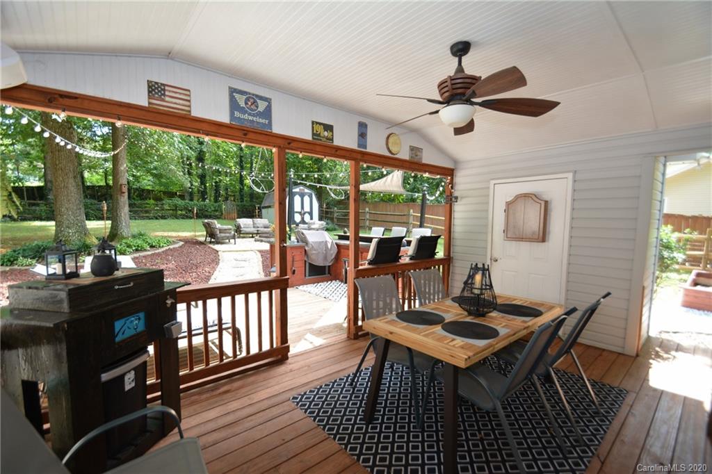 324 Radio Road, Unit 4 Charlotte, NC 28216 - Photo 13 of 19 a view of a dining room with furniture window and outside view
