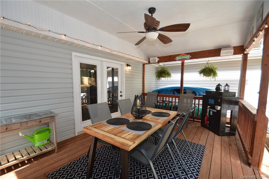 324 Radio Road, Unit 4 Charlotte, NC 28216 - Photo 14 of 19 a dinning table and chairs in a patio