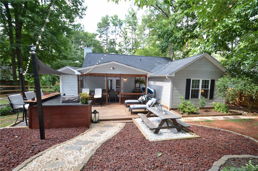 324 Radio Road, Unit 4 Charlotte, NC 28216 - Photo 18 of 19 a view of house with a patio and a yard