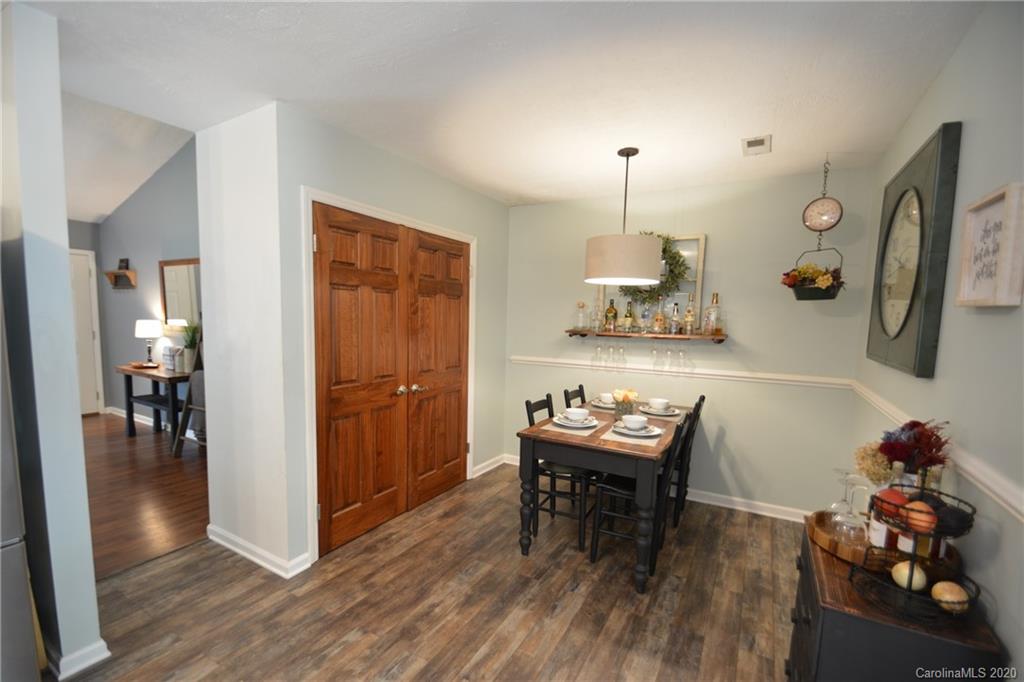 324 Radio Road, Unit 4 Charlotte, NC 28216 - Photo 5 of 19 a room with furniture and wooden floor