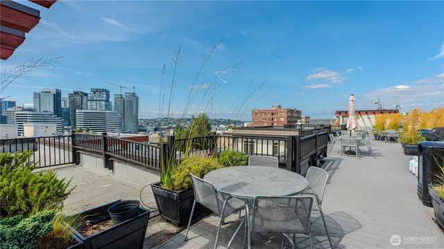 a view of a chairs and table in patio
