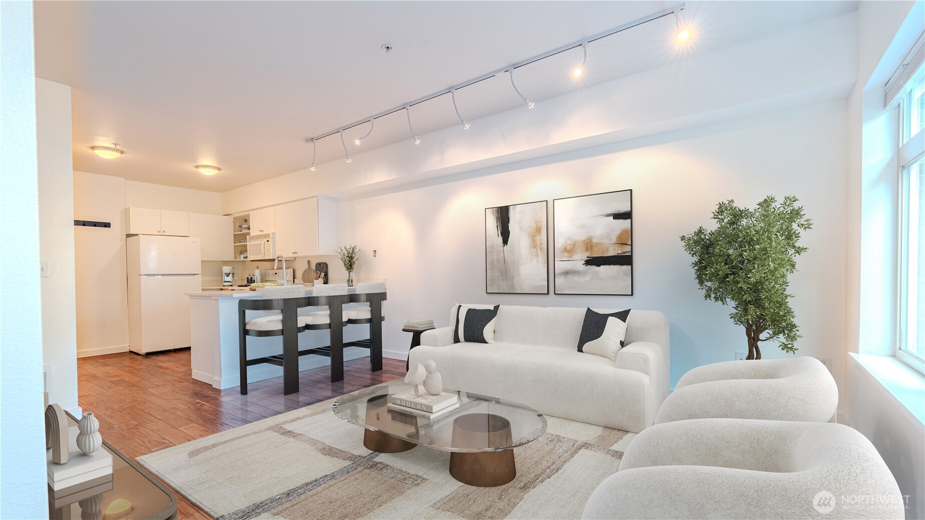 1620 Belmont Avenue, Unit 226 Seattle, WA 98122 - Photo 3 of 19 a living room with furniture and a table