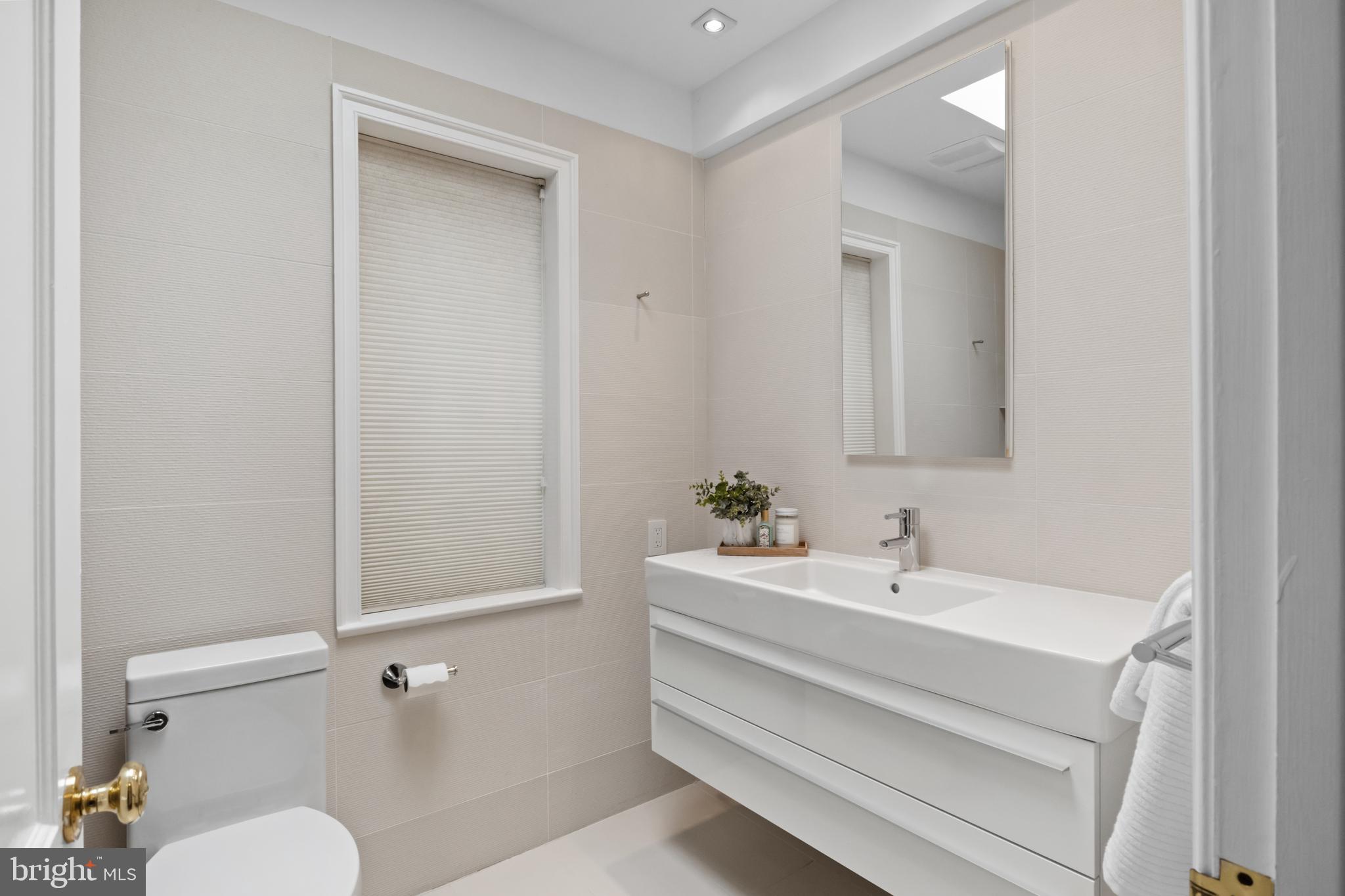 3320 R Street Northwest Washington, DC 20007 - Photo 24 of 48 Thoughtfully placed skylight in primary bath