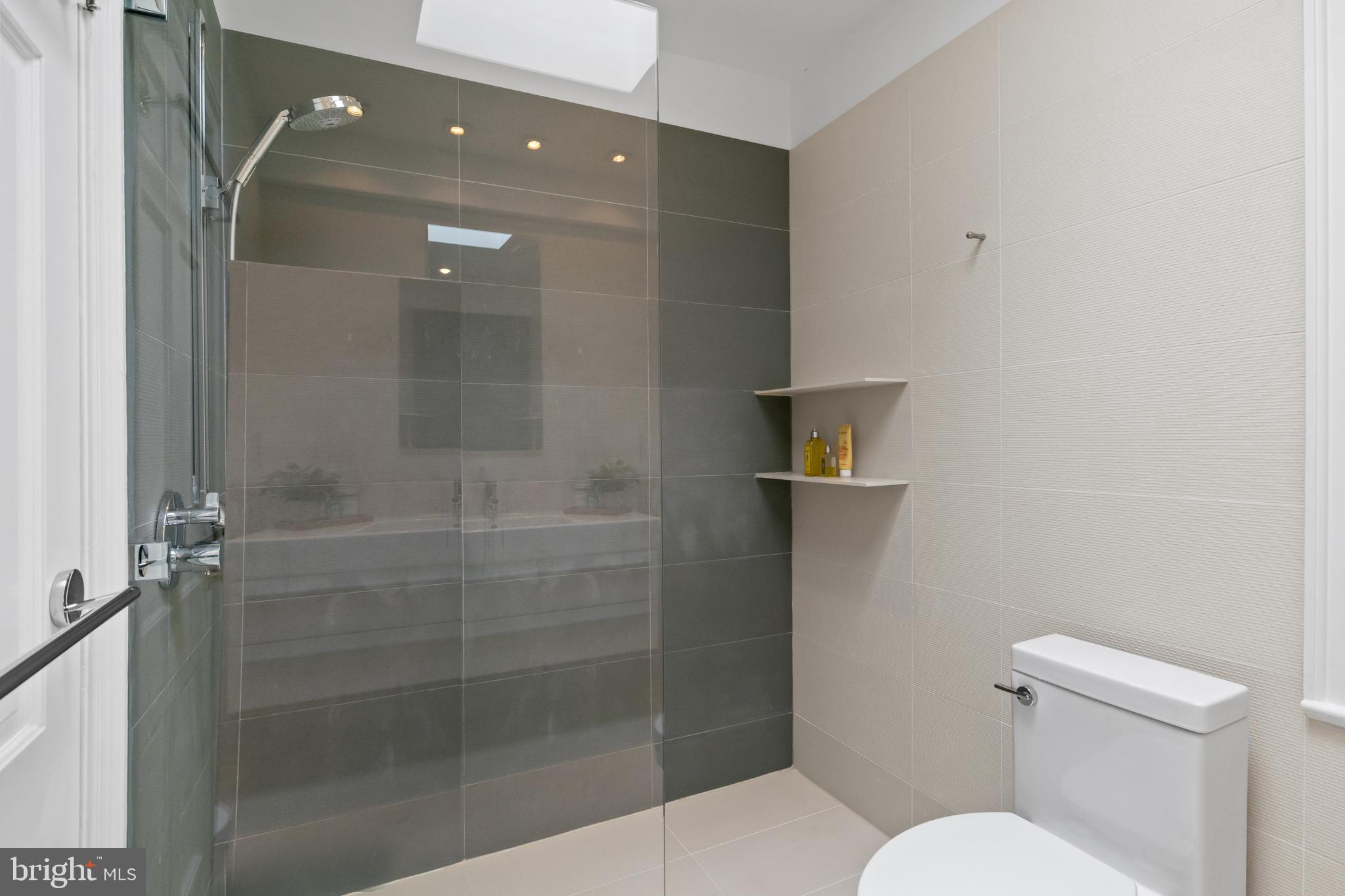 3320 R Street Northwest Washington, DC 20007 - Photo 25 of 48 Primary bath with spa-like features + heated floor