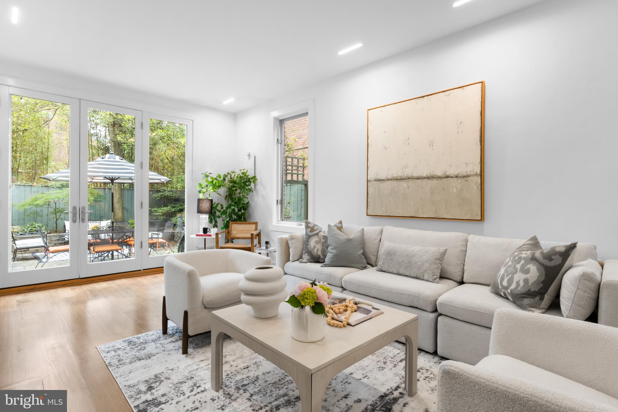 3320 R Street Northwest Washington, DC 20007 - Photo 4 of 48 Open and spacious living leads to the rear patio.