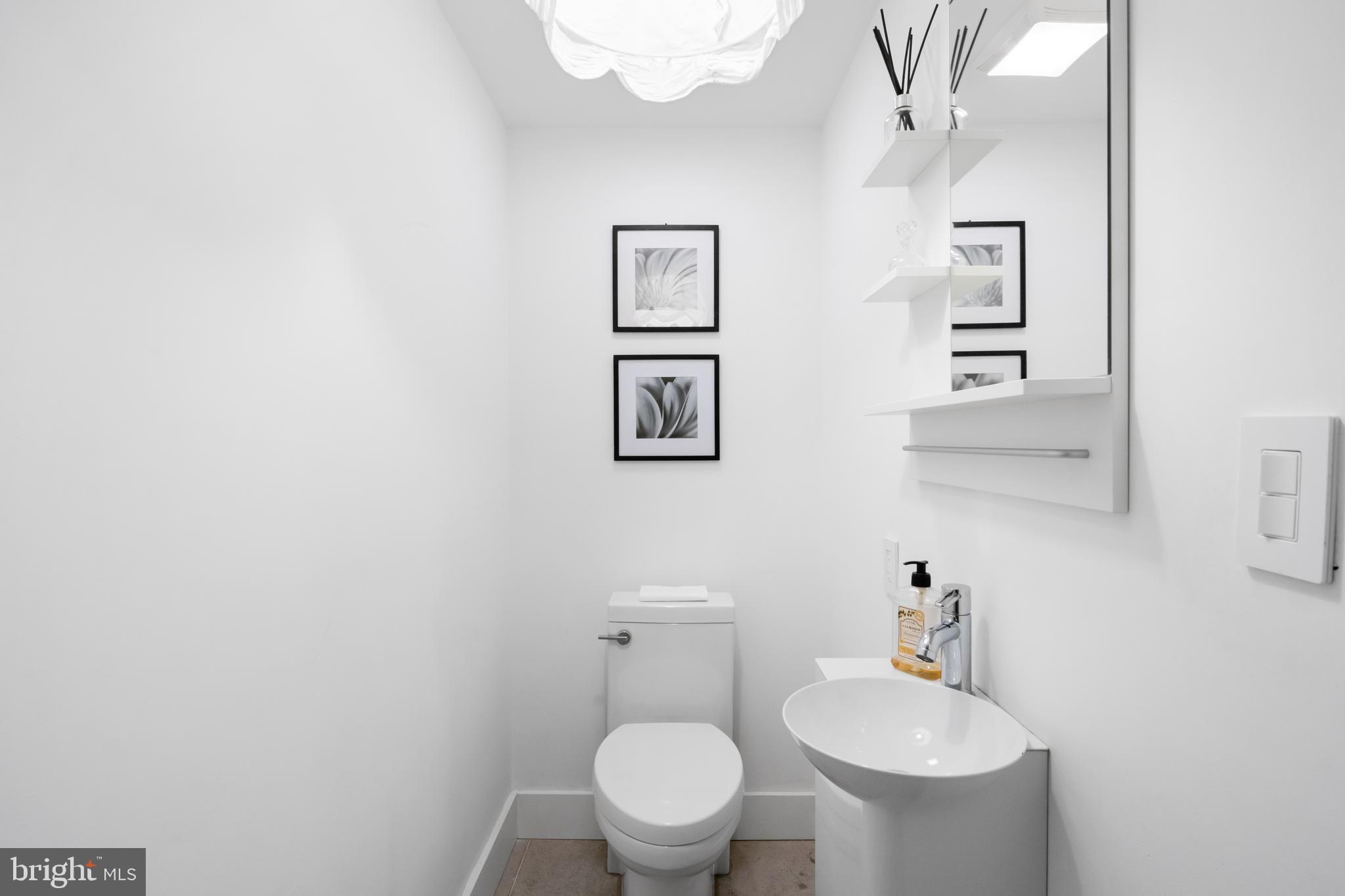 3320 R Street Northwest Washington, DC 20007 - Photo 42 of 48 Half-bathroom on entry level