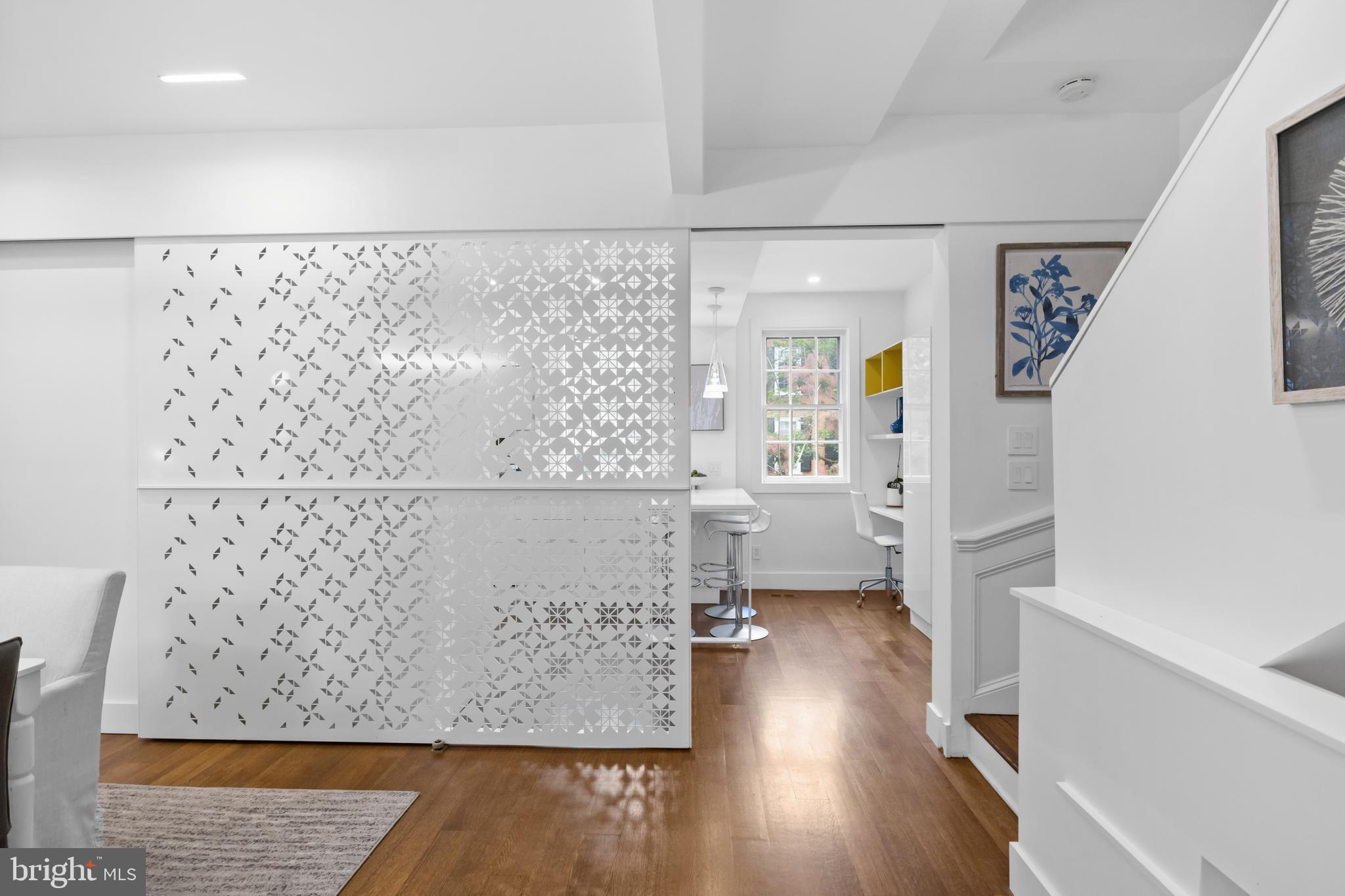 3320 R Street Northwest Washington, DC 20007 - Photo 10 of 48 Custom partition provides privacy from kitchen.