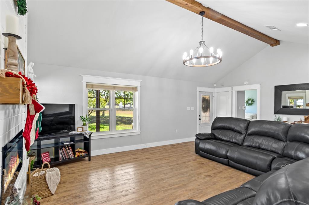 14728 Songbird Lane Haslet, TX 76052 - Photo 11 of 40 a living room with furniture a piano and a flat screen tv