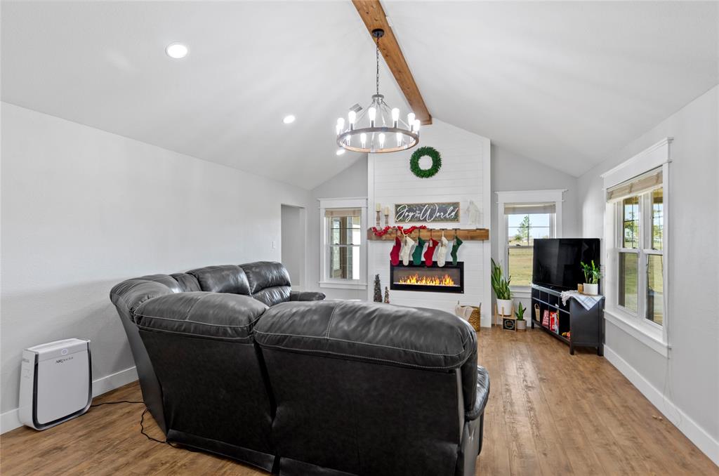14728 Songbird Lane Haslet, TX 76052 - Photo 12 of 40 a living room with furniture and a flat screen tv