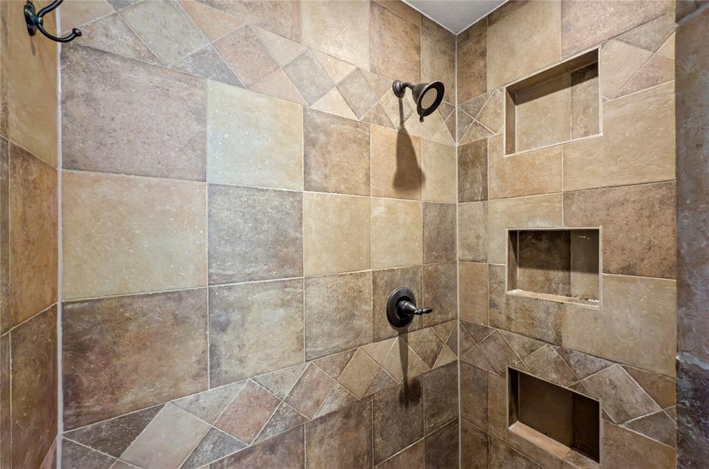 14728 Songbird Lane Haslet, TX 76052 - Photo 18 of 40 a bathroom with a shower
