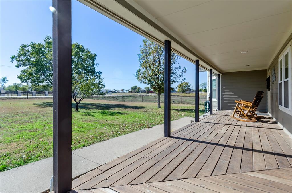 14728 Songbird Lane Haslet, TX 76052 - Photo 2 of 40 a view of a deck with wooden floor and city view