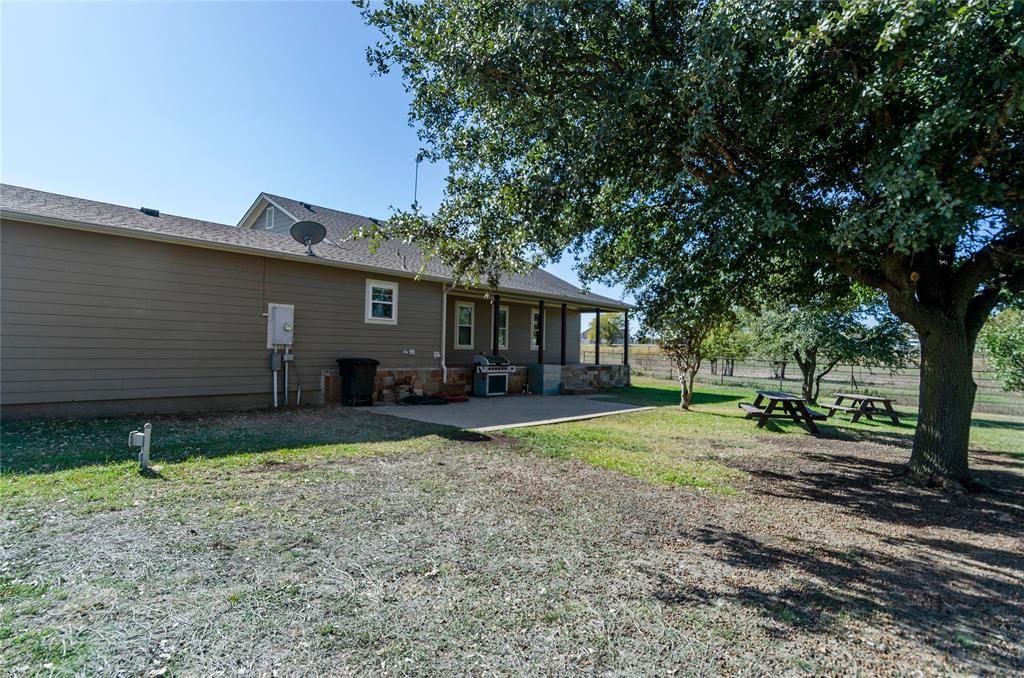 14728 Songbird Lane Haslet, TX 76052 - Photo 26 of 40 a house view with a backyard space