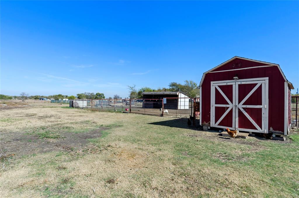 14728 Songbird Lane Haslet, TX 76052 - Photo 28 of 40 a view of an house with backyard