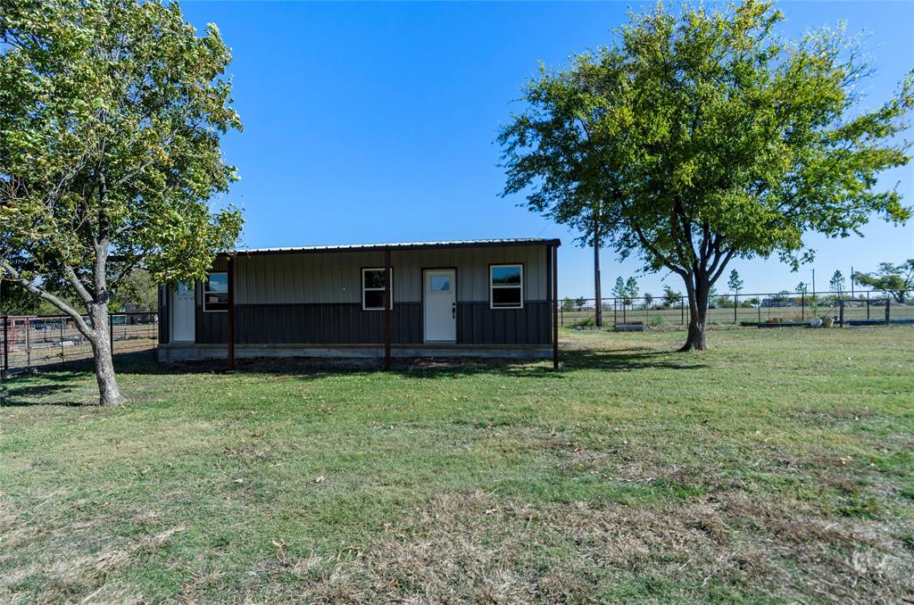 14728 Songbird Lane Haslet, TX 76052 - Photo 32 of 40 a house view with a garden space