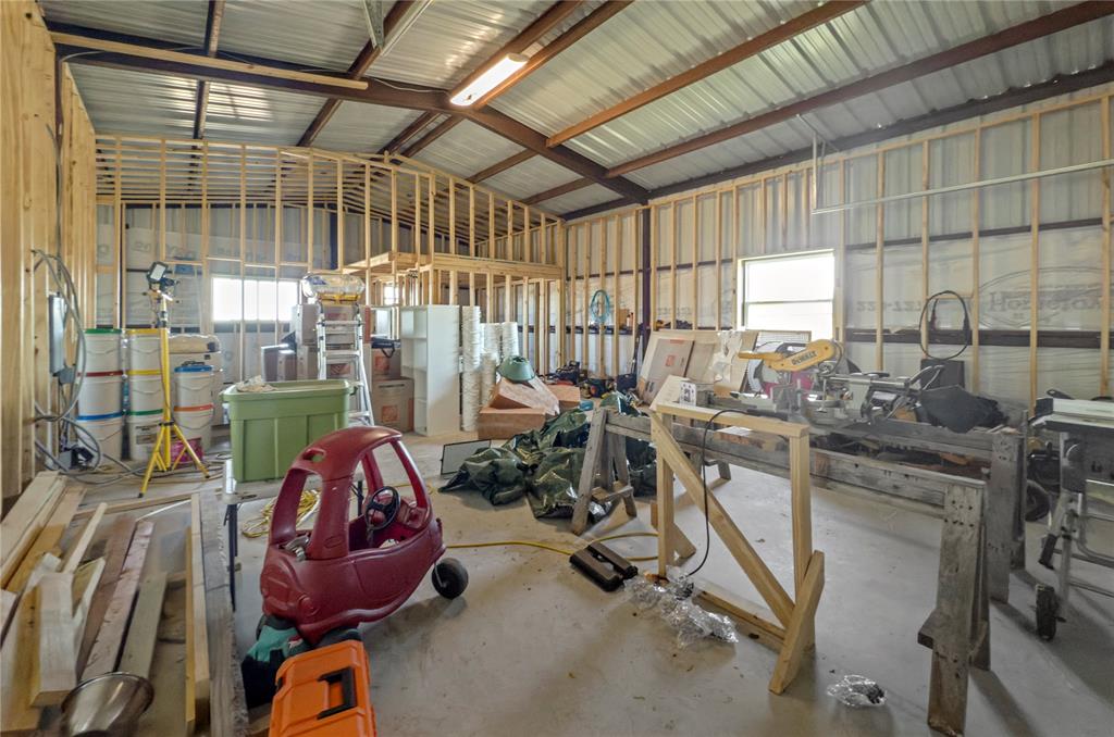 14728 Songbird Lane Haslet, TX 76052 - Photo 35 of 40 a view of a room with gym equipment
