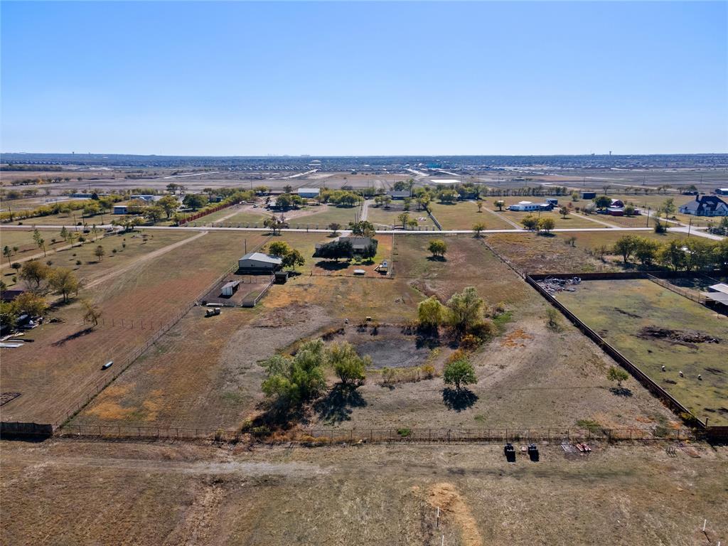 14728 Songbird Lane Haslet, TX 76052 - Photo 39 of 40 an aerial view of a yard with horses