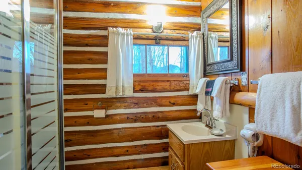 a bathroom with a toilet and a sink