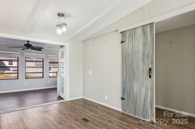 a kitchen with granite countertop a sink stainless steel appliances and cabinets